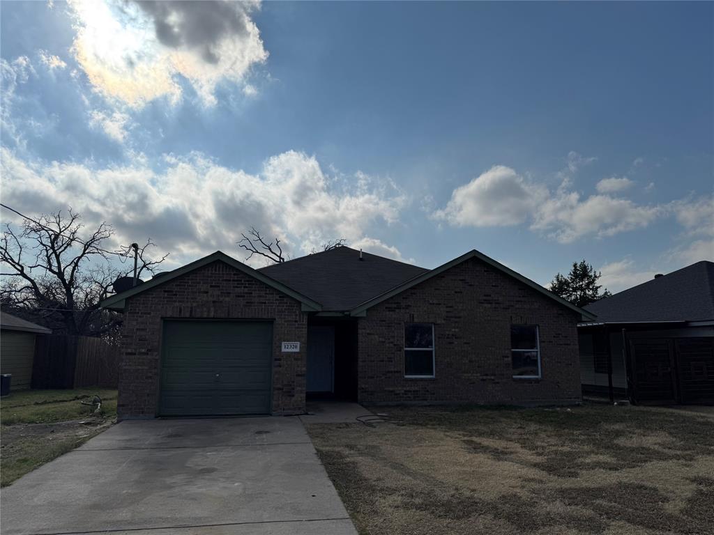 12320 Fish Road Dallas, TX 75253 - Photo 2 of 11 a front view of a house with a yard