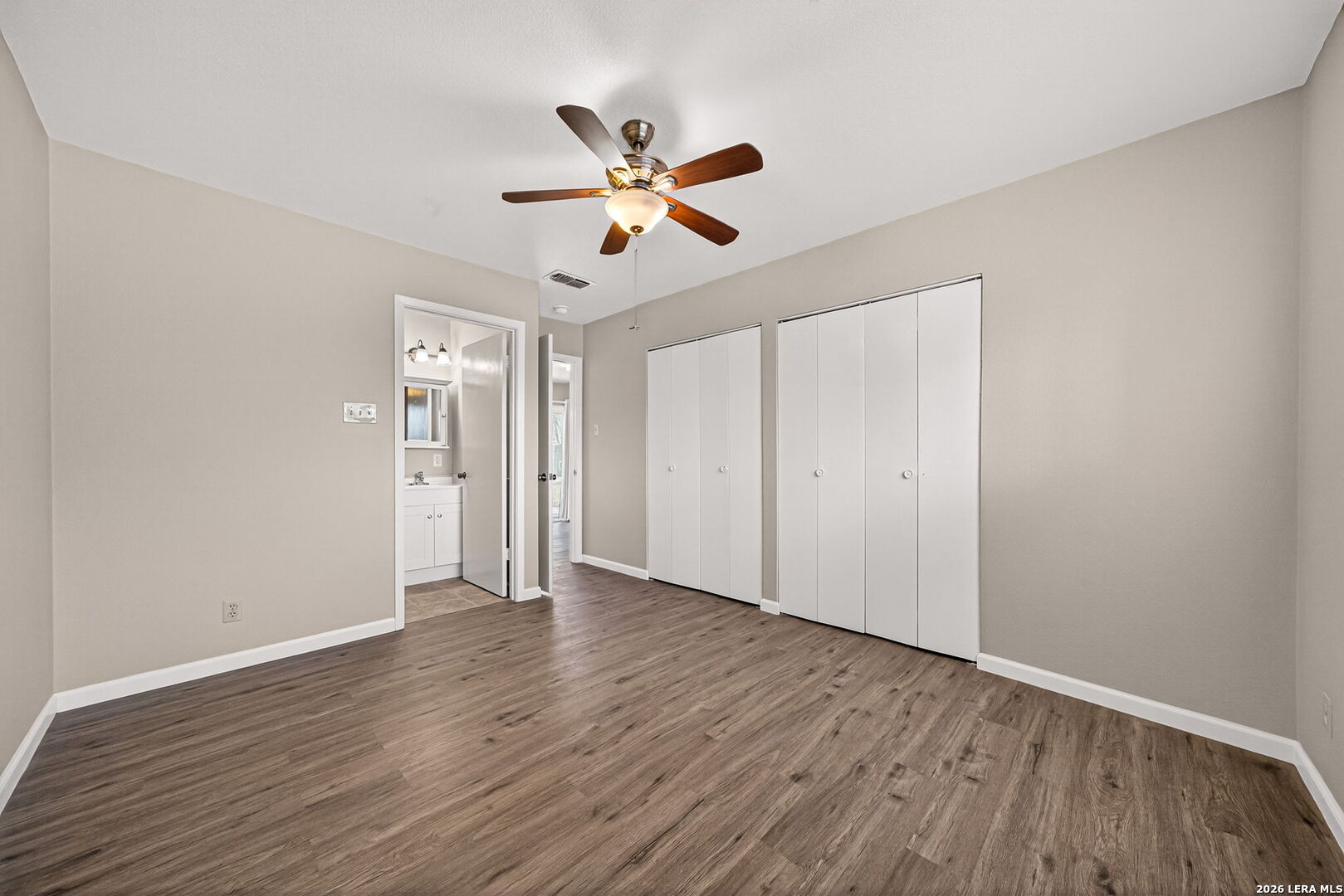301 Deborah Drive Converse, TX 78109 - Photo 17 of 27 a view of empty room with wooden floor