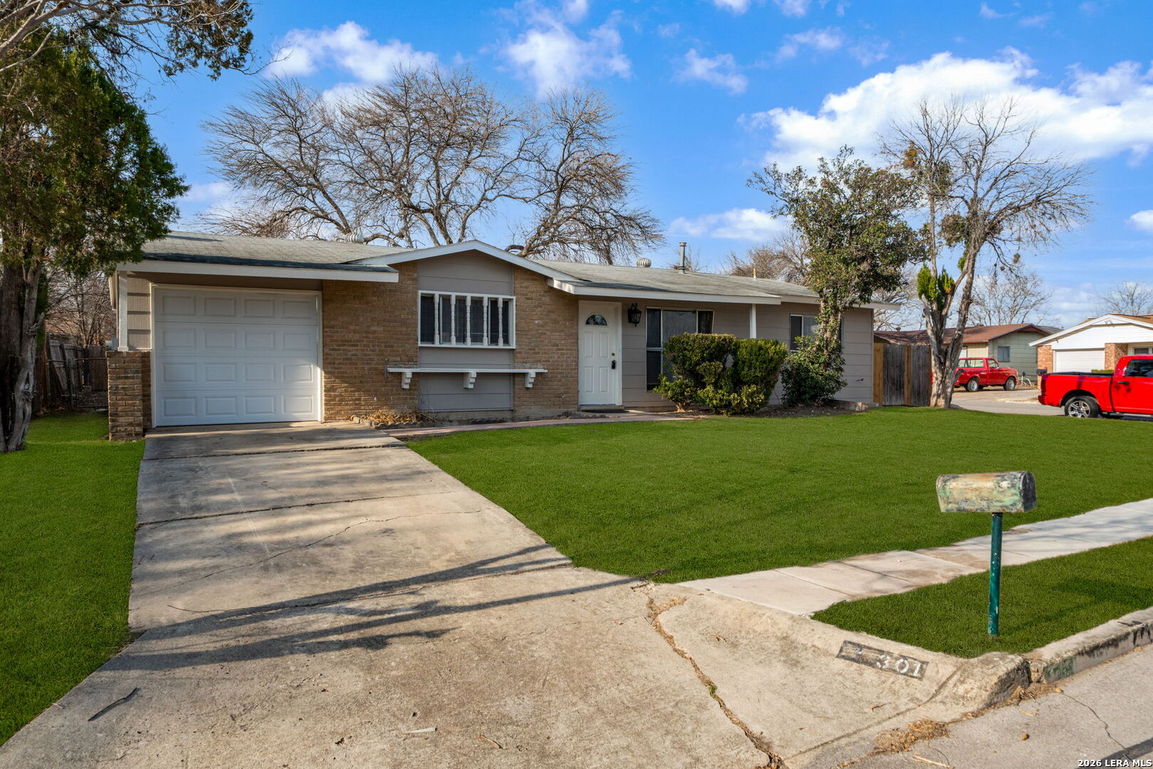 301 Deborah Drive Converse, TX 78109 - Photo 2 of 27 a front view of a house with a yard
