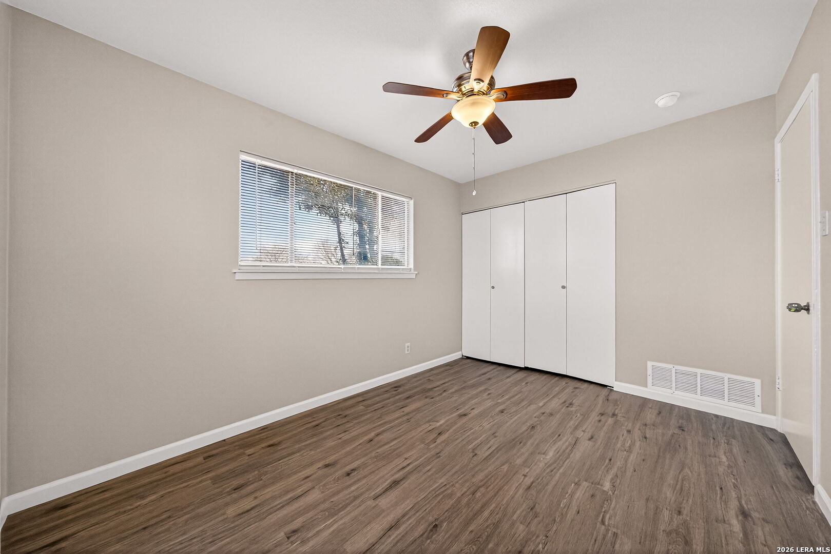301 Deborah Drive Converse, TX 78109 - Photo 22 of 27 a view of empty room with wooden floor