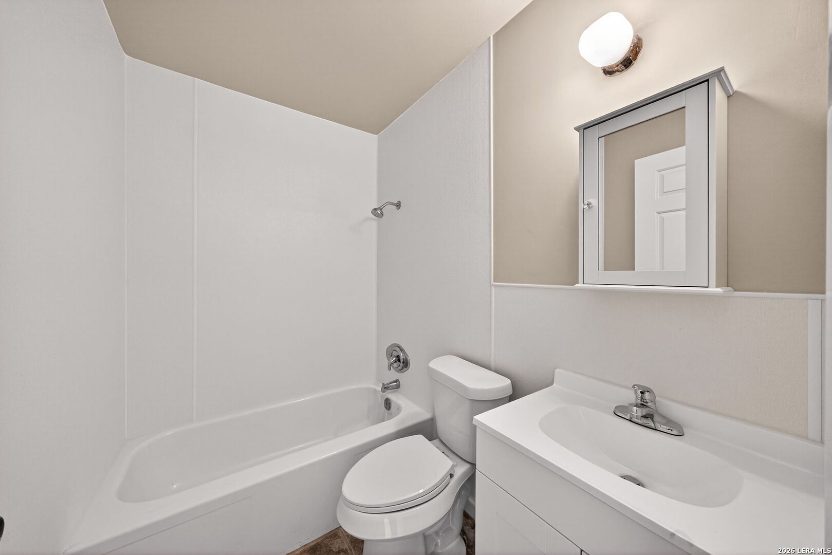 301 Deborah Drive Converse, TX 78109 - Photo 23 of 27 a bathroom with a bathtub shower sink vanity mirror and toilet