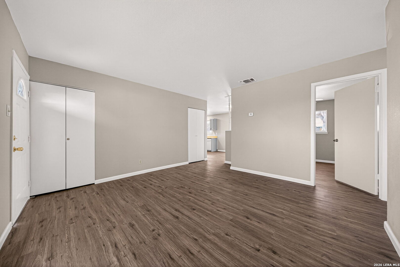 301 Deborah Drive Converse, TX 78109 - Photo 8 of 27 a view of an empty room with wooden floor and closet