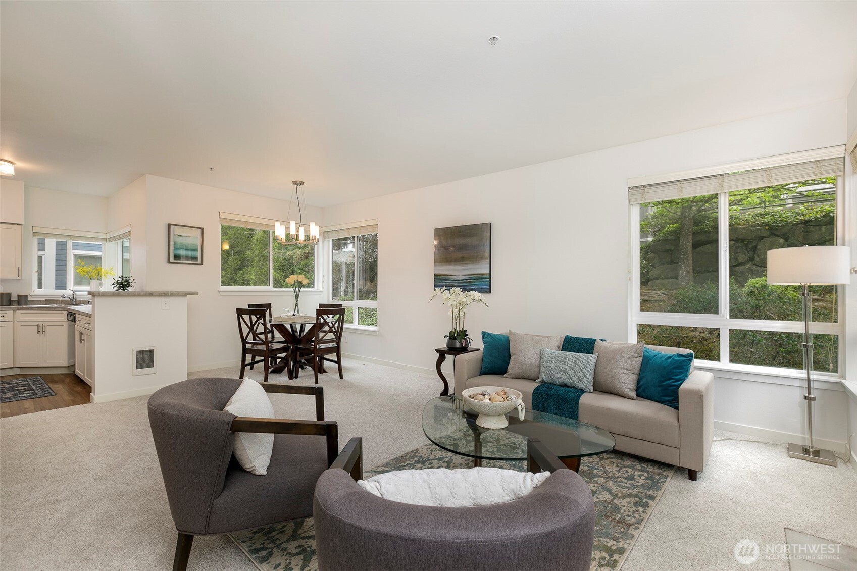 3915 243rd Place Southeast, Unit K204 Bothell, WA 98021 - Photo 8 of 23 a living room with furniture and a large window