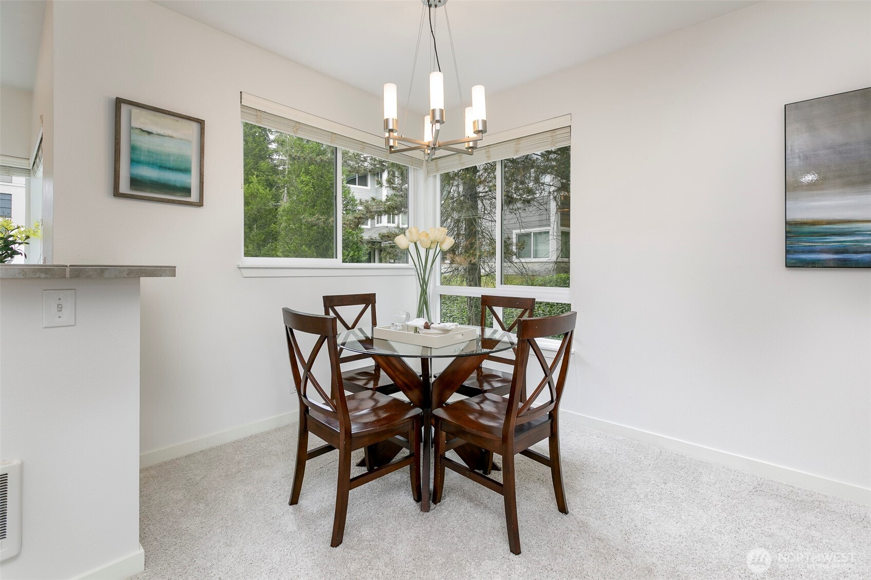 3915 243rd Place Southeast, Unit K204 Bothell, WA 98021 - Photo 9 of 23 a view of a dining room with furniture window and outside view