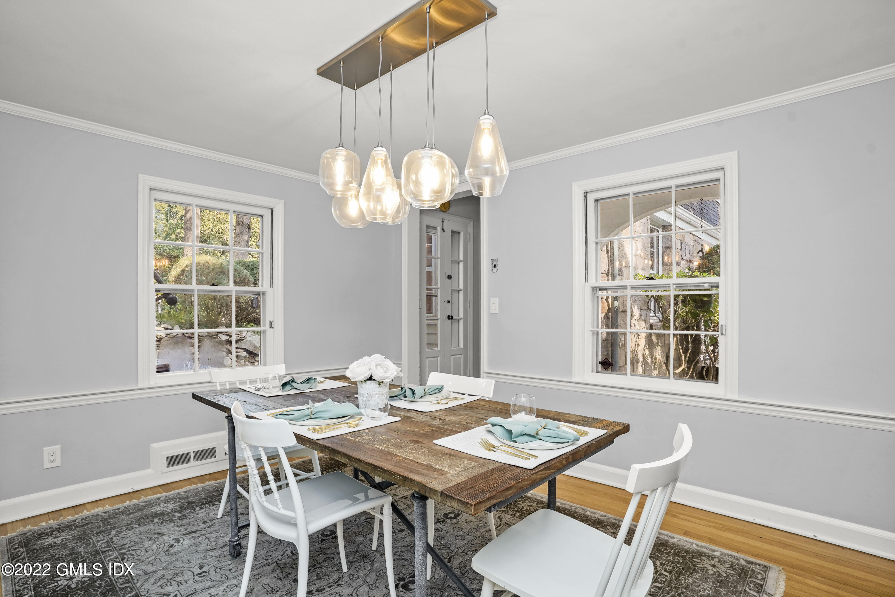 11 Wesskum Wood Road Riverside, CT 06878 - Photo 4 of 17 a view of a dining room with furniture window and wooden floor
