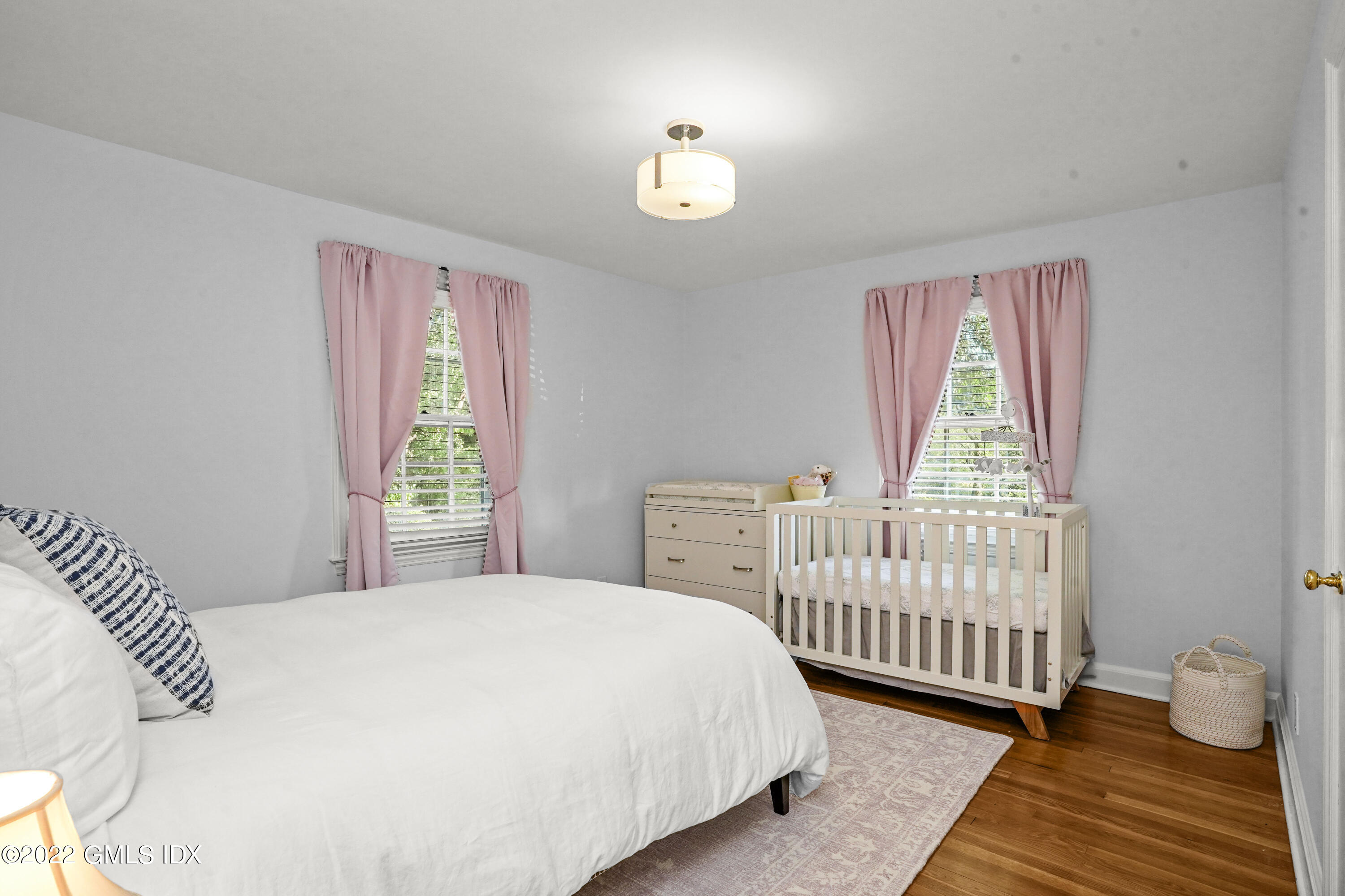 11 Wesskum Wood Road Riverside, CT 06878 - Photo 9 of 17 a bedroom with a bed and a window