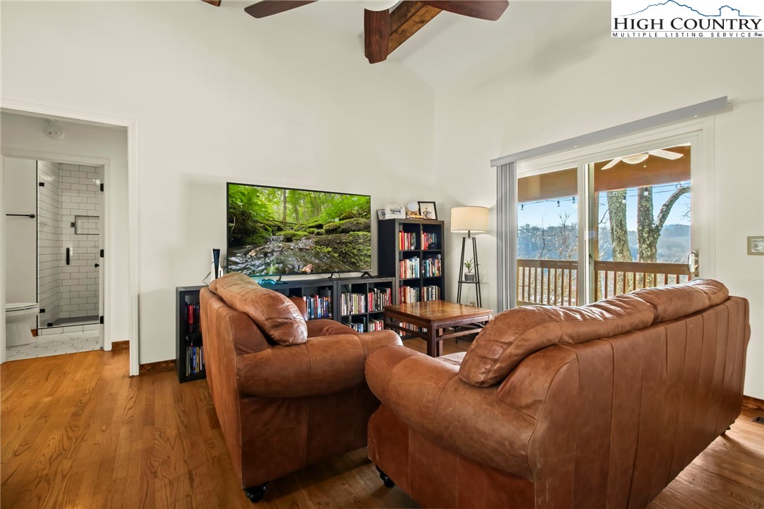 282 Charles Street Boone, NC 28607 - Photo 11 of 47 a living room with furniture and a flat screen tv