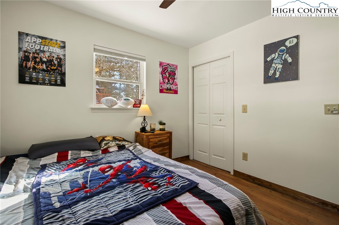 282 Charles Street Boone, NC 28607 - Photo 13 of 47 a bedroom with a bed and dresser