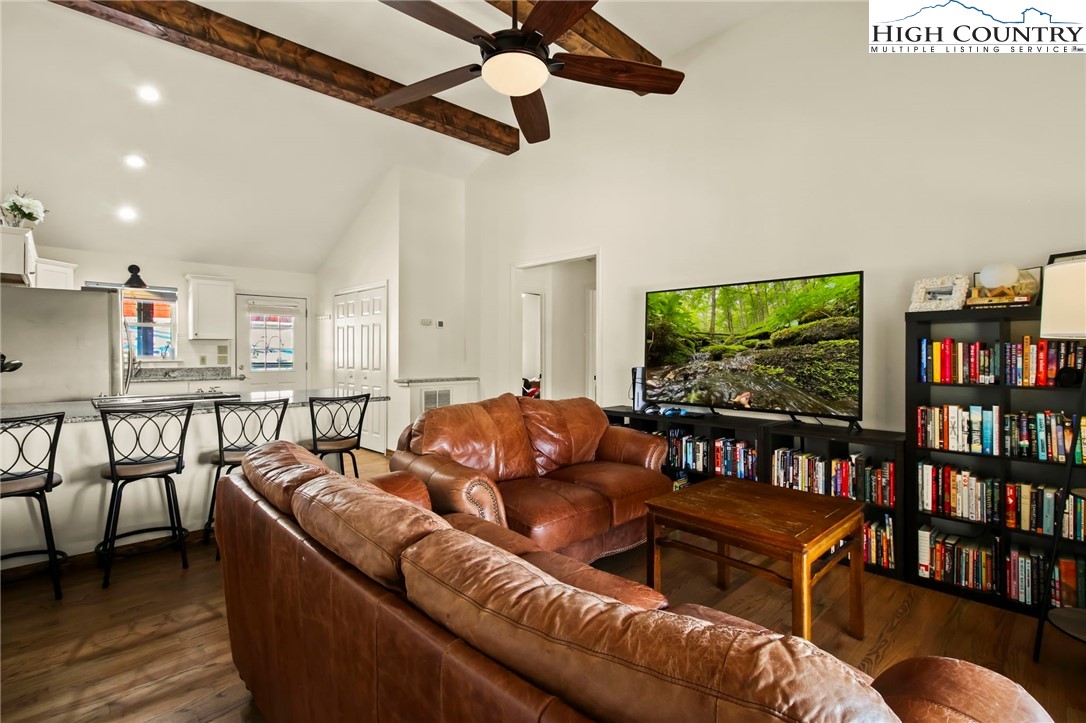282 Charles Street Boone, NC 28607 - Photo 3 of 47 a living room with furniture and a flat screen tv