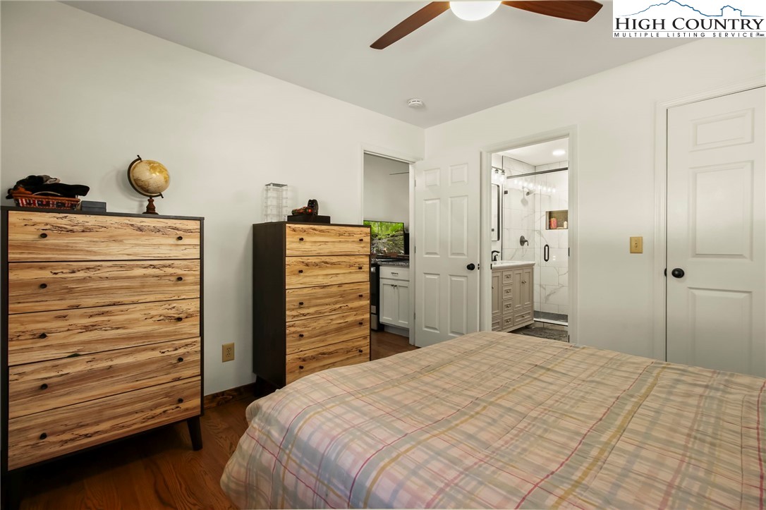 282 Charles Street Boone, NC 28607 - Photo 6 of 47 a bedroom with a bed and cabinets