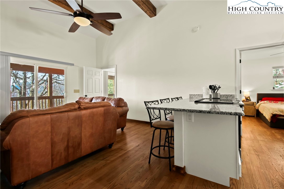 282 Charles Street Boone, NC 28607 - Photo 10 of 47 a living room with a couch and a window
