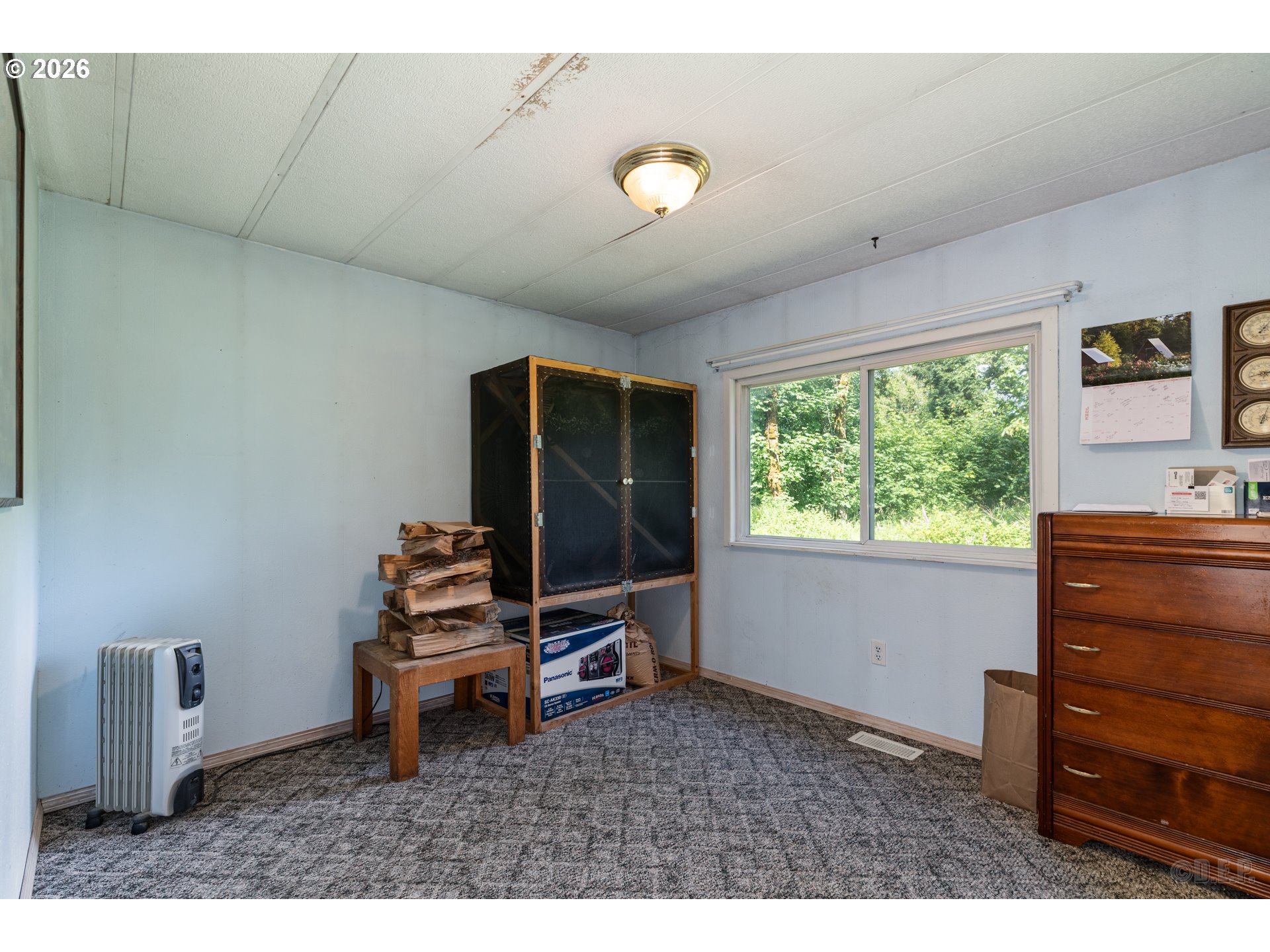 66971 Maplecrest Road Deer Island, OR 97054 - Photo 14 of 24 a living room with furniture and a window
