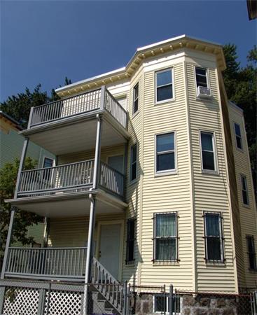 31 Torrey Street Boston, MA 02124 - Photo 1 of 11 a view of a house with a balcony
