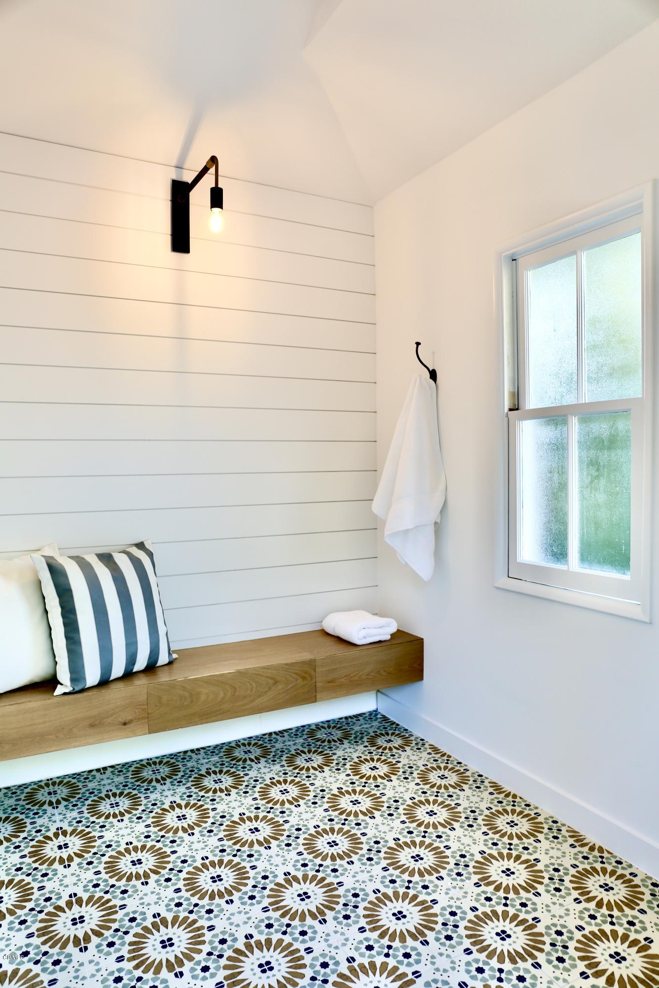 300 Wigmore Drive Pasadena, CA 91105 - Photo 52 of 59 a bathroom with a bathtub and shower