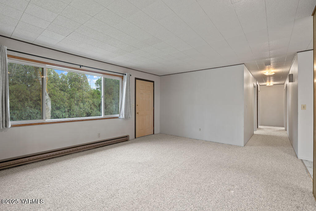 3820 Lateral B Road Wapato, WA 98951 - Photo 11 of 35 a view of an empty room with a window