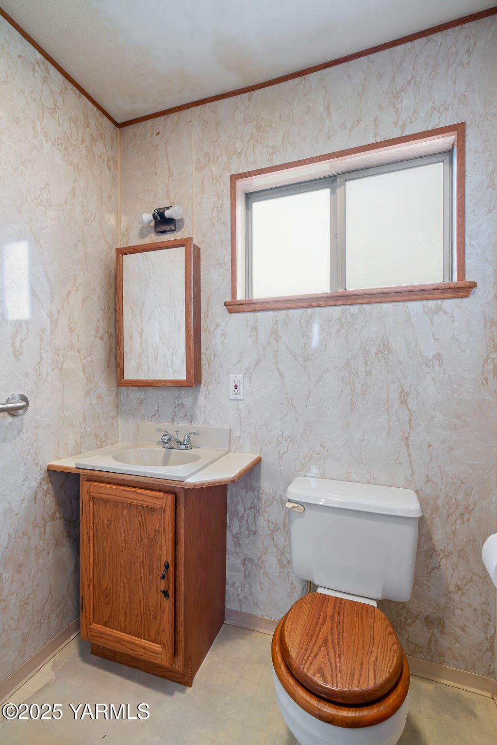 3820 Lateral B Road Wapato, WA 98951 - Photo 21 of 35 a bathroom with a toilet a sink and mirror