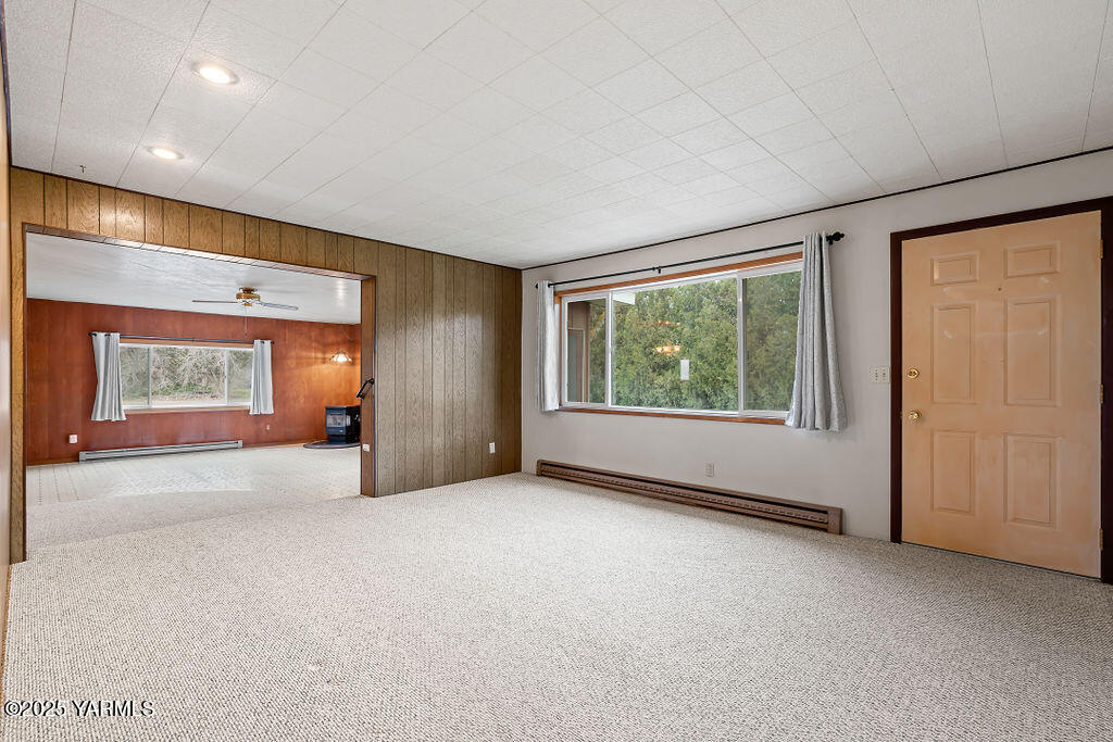 3820 Lateral B Road Wapato, WA 98951 - Photo 10 of 35 a view of an empty room with a window and doors