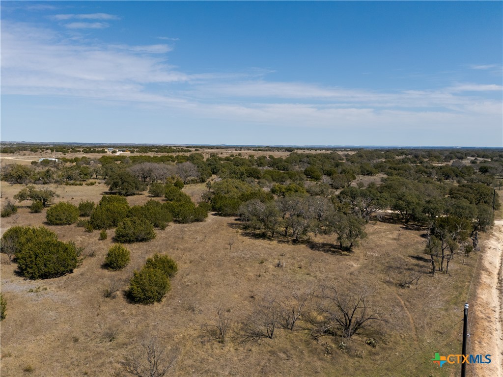 Tbd Tbd Drive Lampasas, TX 76550 - Photo 5 of 22 a view of a beach with a building in the background