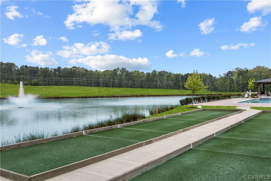 6601 Citory Way, Unit 305 Moseley, VA 23120 - Photo 20 of 23 a view of a lake with a yard