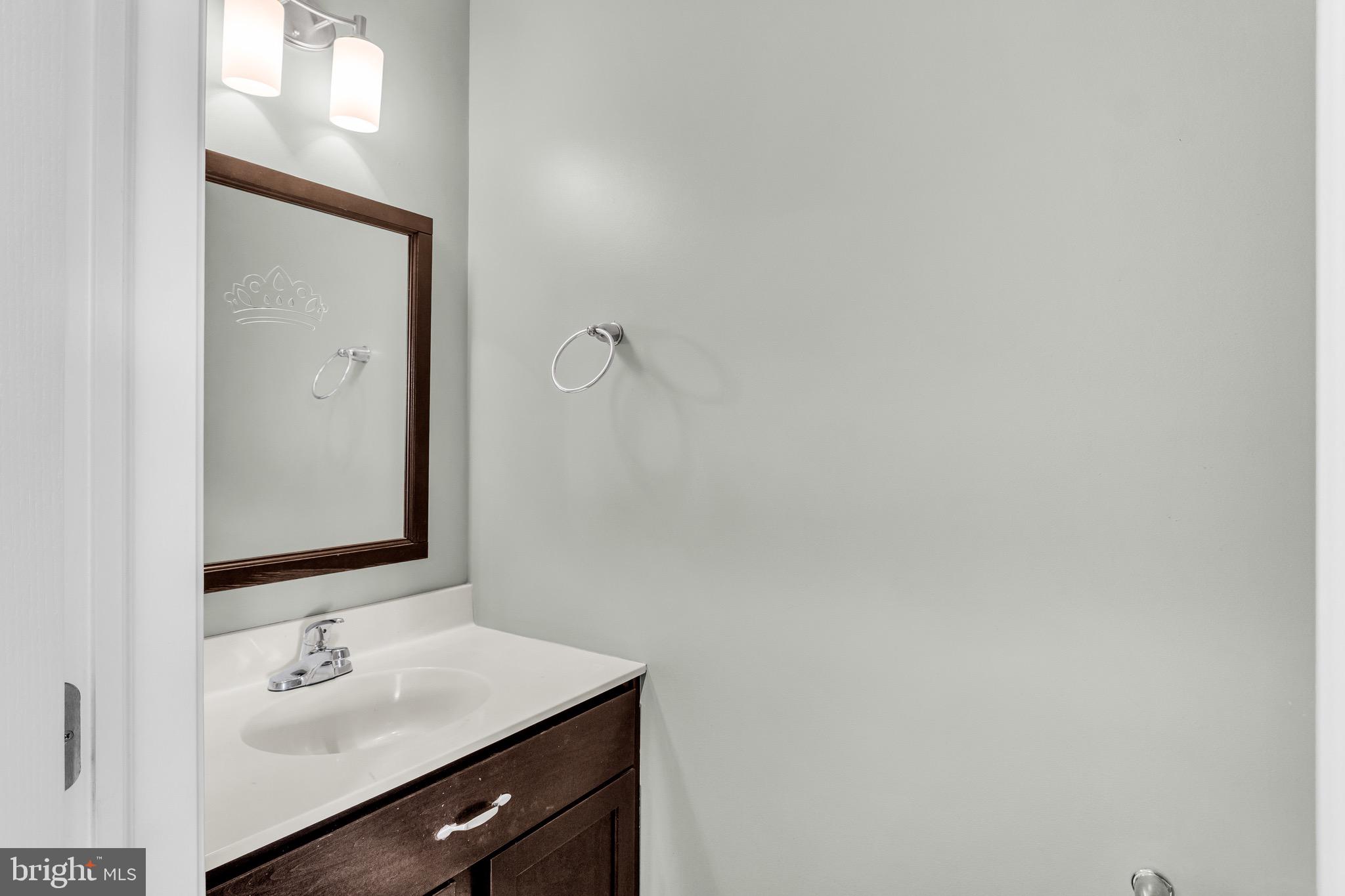 25 Springbrook Drive Palmyra, PA 17078 - Photo 13 of 34 a bathroom with a sink and a mirror