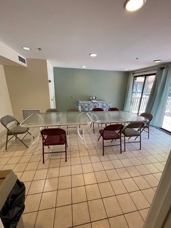 50 Rantoul Street, Unit 110 Beverly, MA 01915 - Photo 30 of 37 a outdoor space with chairs