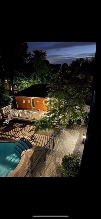 50 Rantoul Street, Unit 110 Beverly, MA 01915 - Photo 31 of 37 a view of swimming pool from a yard