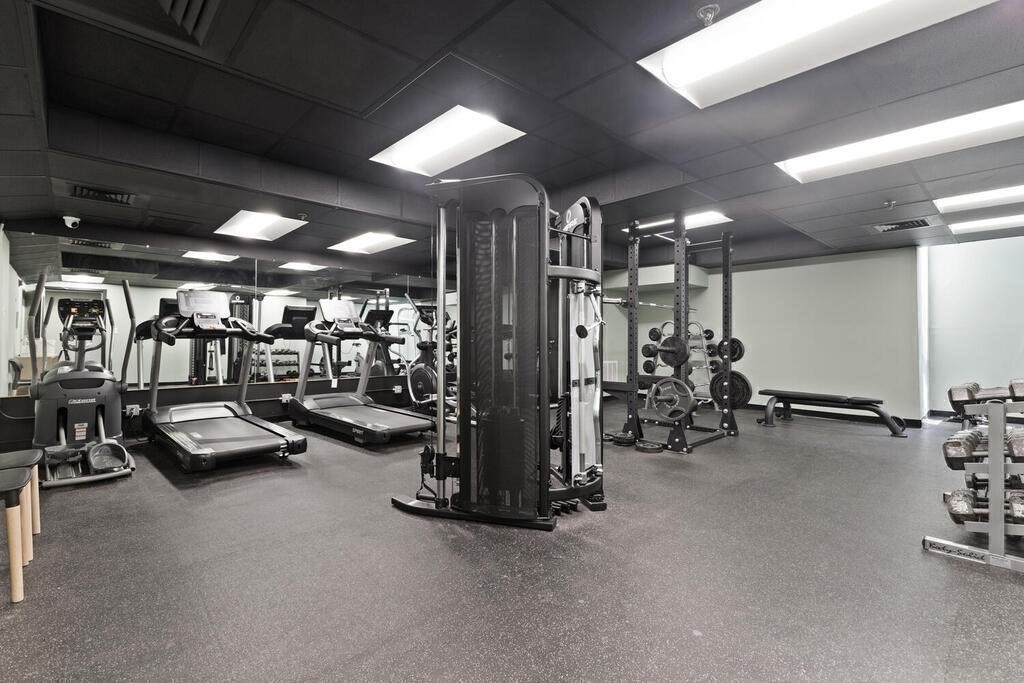 50 Rantoul Street, Unit 110 Beverly, MA 01915 - Photo 33 of 37 a view of a room with gym equipment