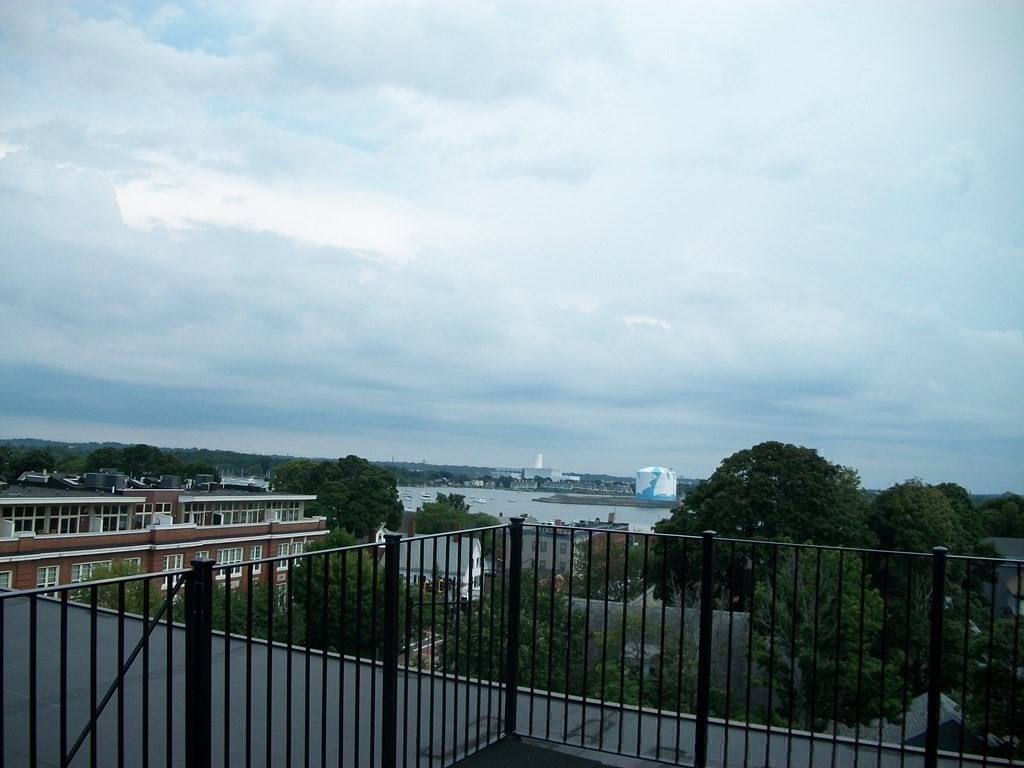 50 Rantoul Street, Unit 110 Beverly, MA 01915 - Photo 37 of 37 a view of city with balcony