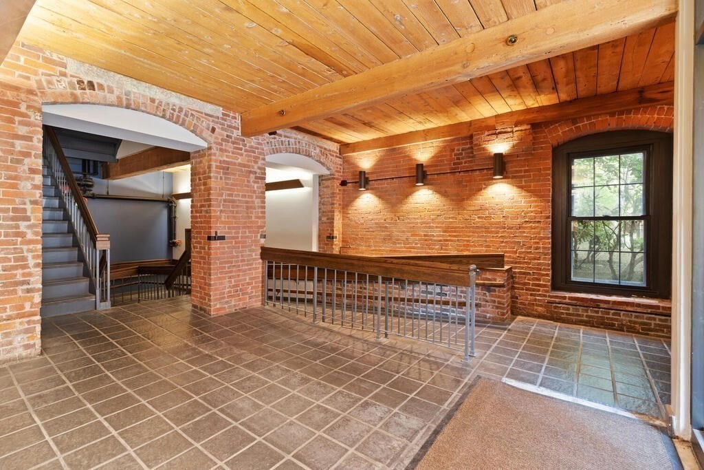 50 Rantoul Street, Unit 110 Beverly, MA 01915 - Photo 7 of 37 a view of railway station with sitting area