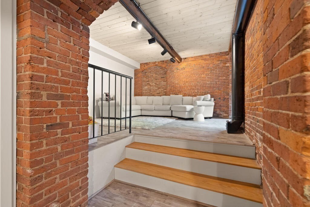 50 Rantoul Street, Unit 110 Beverly, MA 01915 - Photo 10 of 37 a view of entryway with pathway