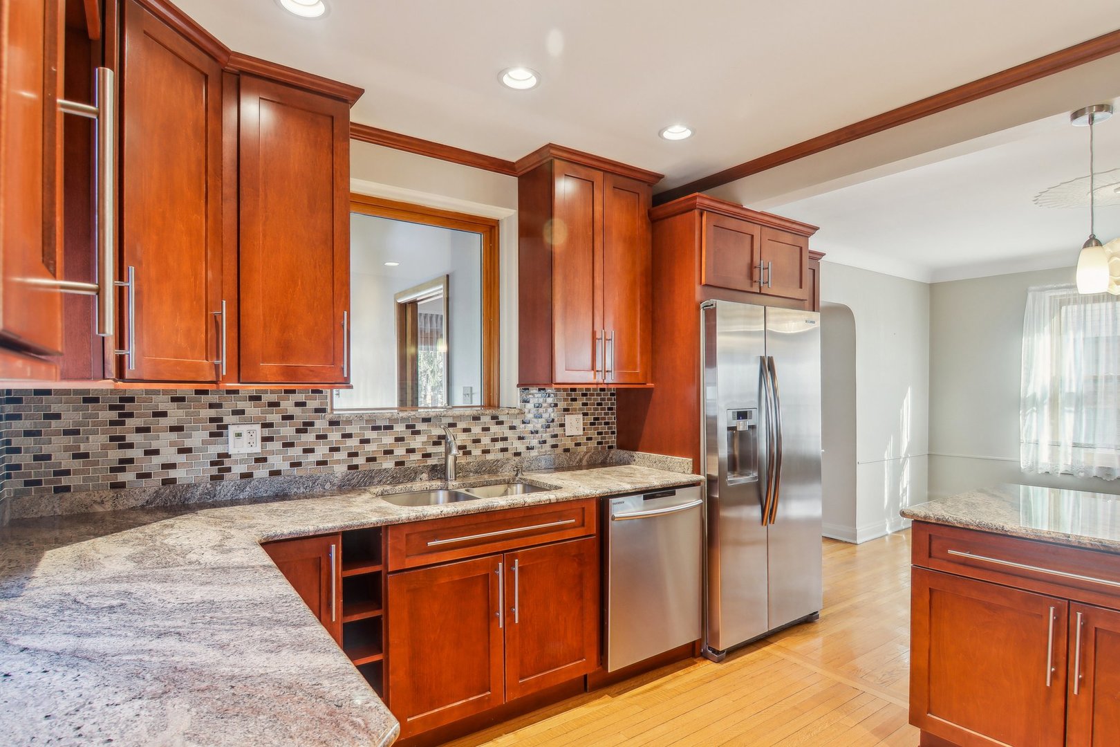 38 Northgate Road Riverside, IL 60546 - Photo 12 of 52 a bathroom with a sink a mirror and a shower