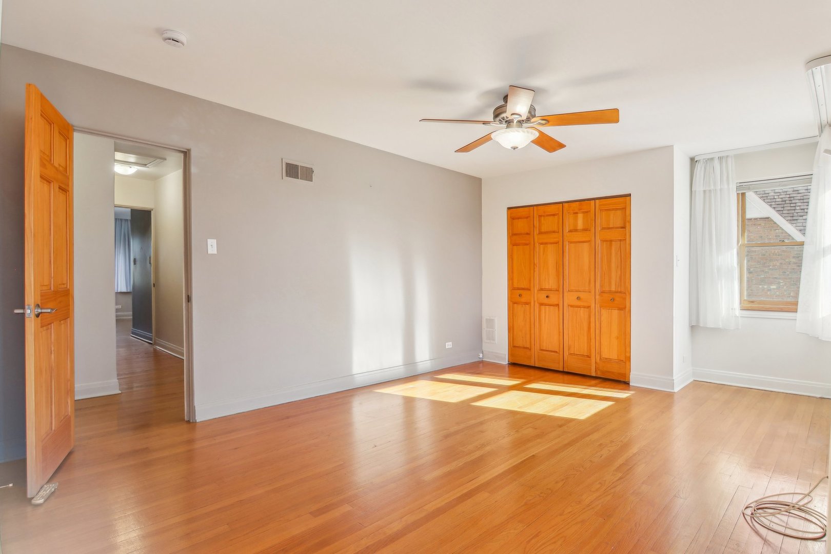 38 Northgate Road Riverside, IL 60546 - Photo 20 of 52 an empty room with windows and ceiling fan