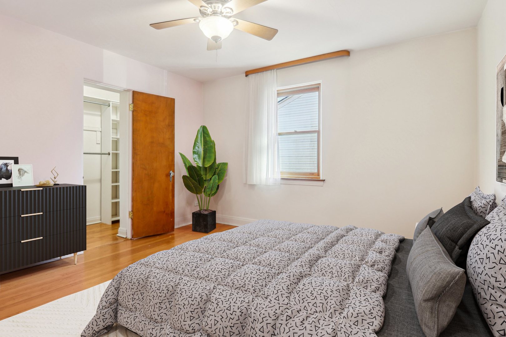 38 Northgate Road Riverside, IL 60546 - Photo 23 of 52 a bedroom with a bed and a chandelier