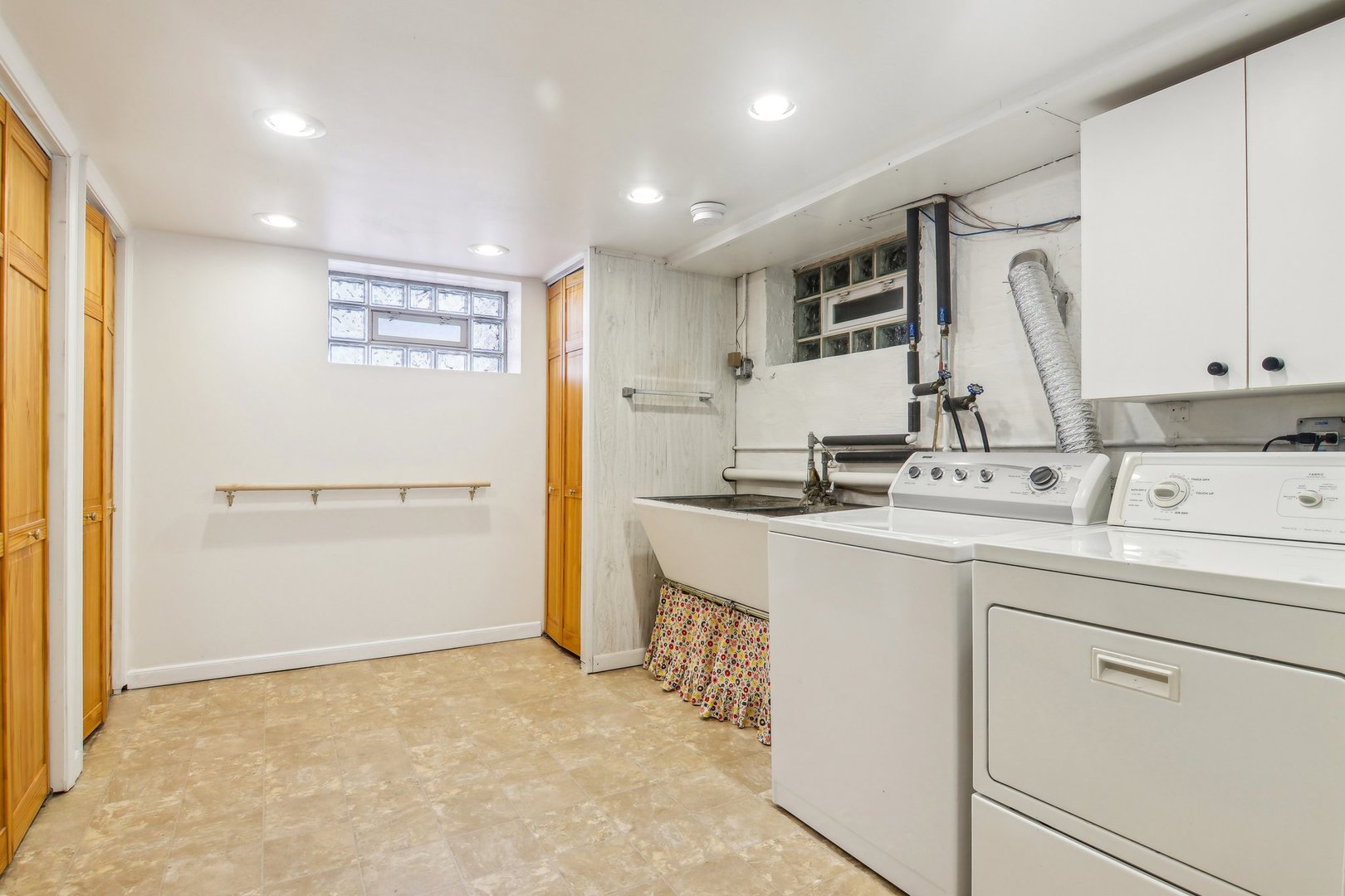 38 Northgate Road Riverside, IL 60546 - Photo 30 of 52 a kitchen with a sink cabinets and wooden floor