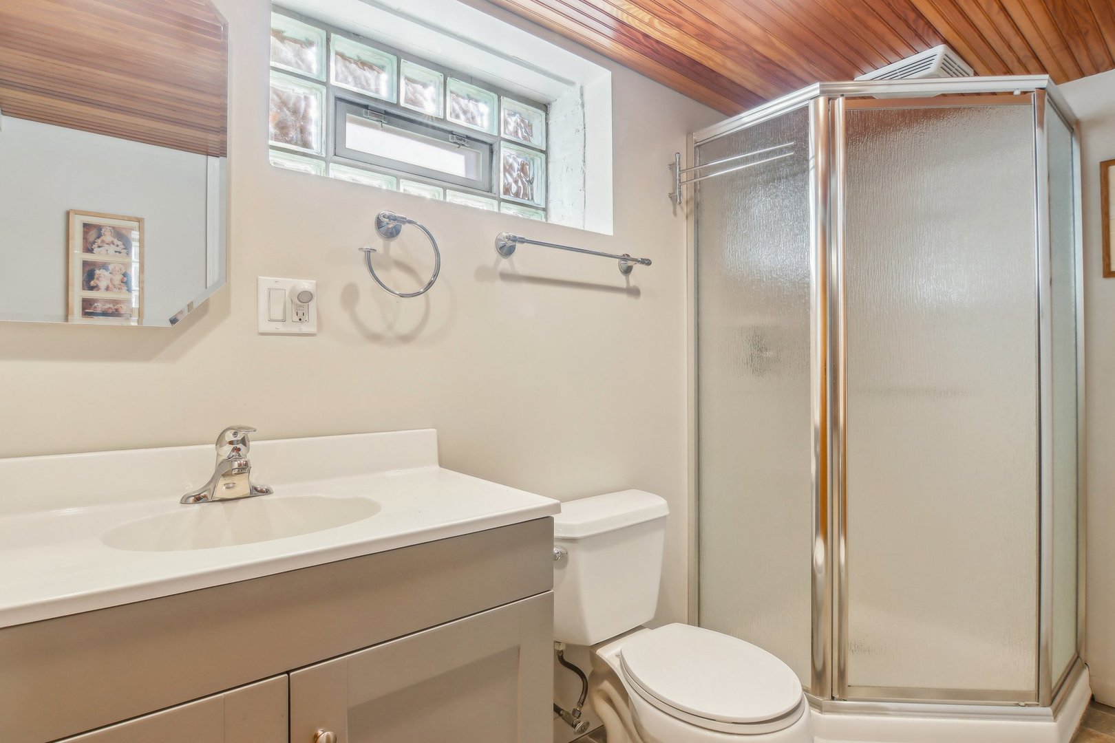 38 Northgate Road Riverside, IL 60546 - Photo 33 of 52 a bathroom with a sink vanity mirror and toilet