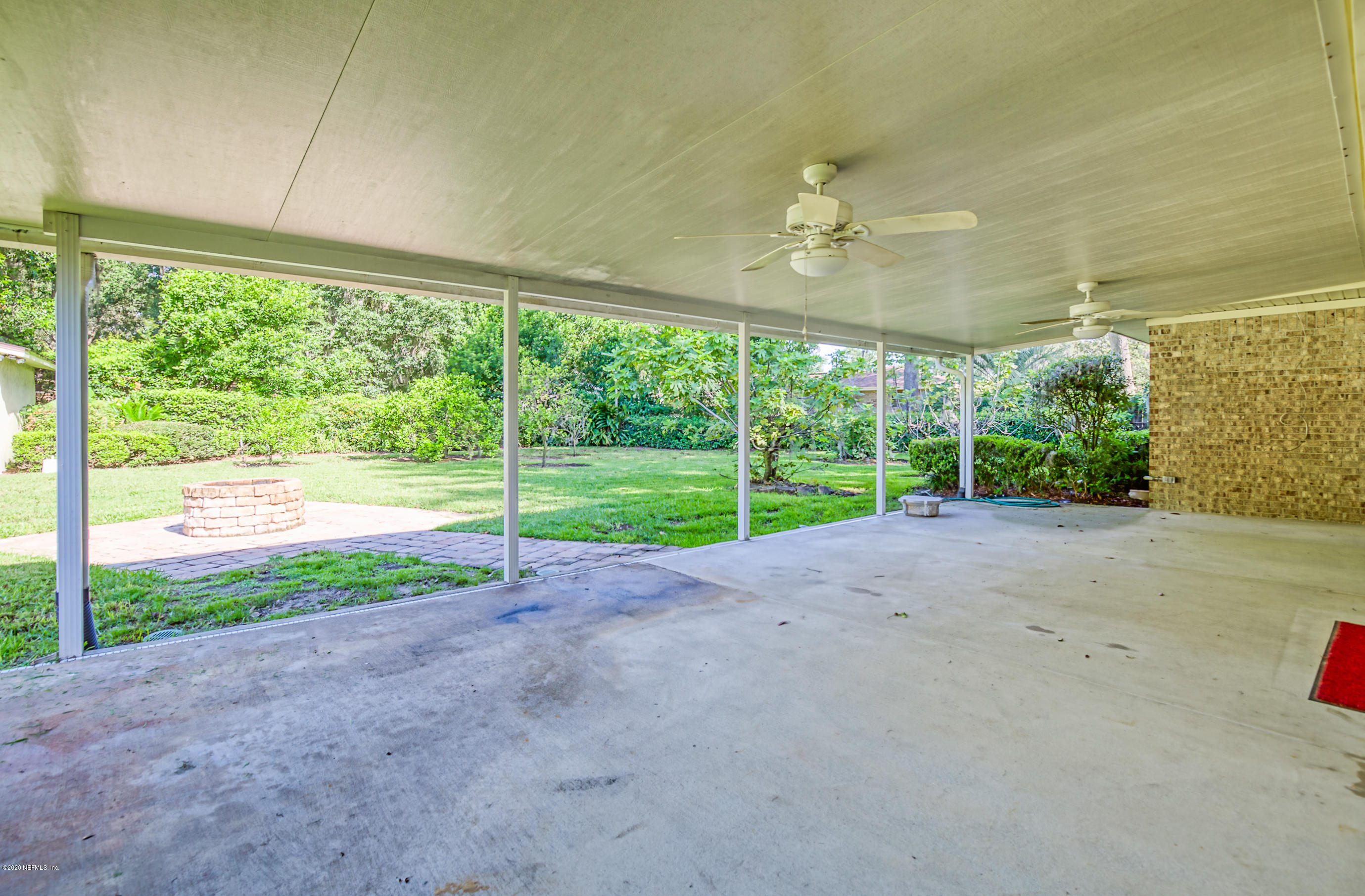 4024 Heath Road Jacksonville, FL 32277 - Photo 34 of 37 a view of a room with porch and garden