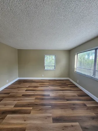 a view of a room that has a window