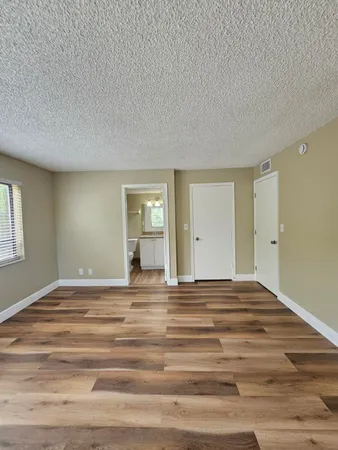 a view of a livingroom with a dresser