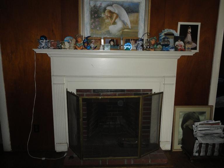 45 Johnny Cake Road Centerville, MA 02632 - Photo 3 of 5 a sink with a fireplace