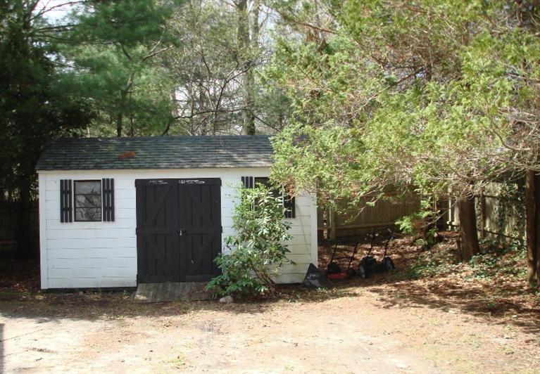 45 Johnny Cake Road Centerville, MA 02632 - Photo 5 of 5 a view of house with trees in the background