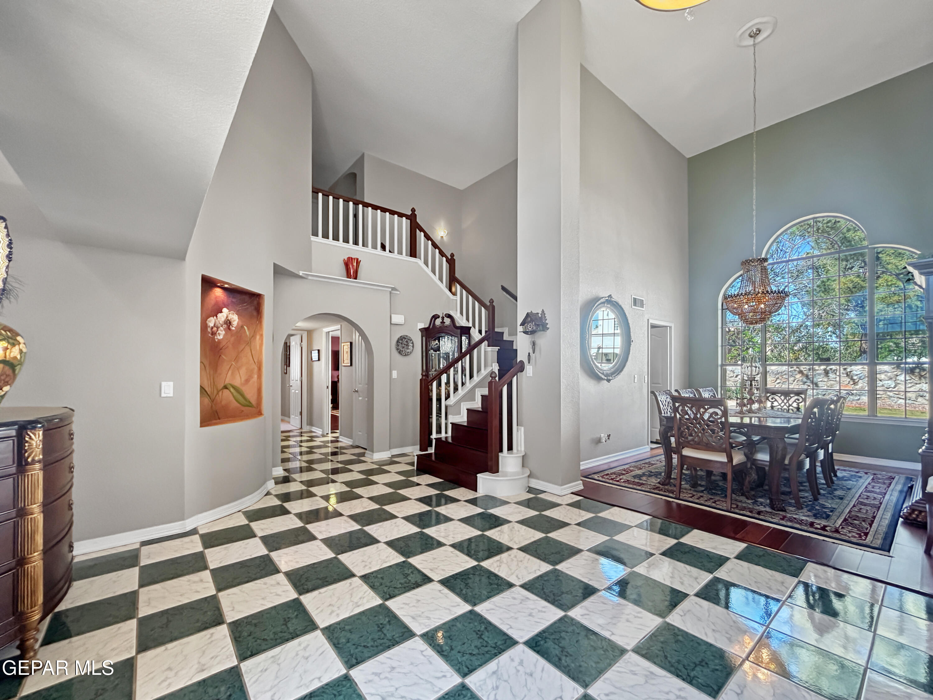 1109 Noble Ridge Way El Paso, TX 79912 - Photo 16 of 73 Living Room to Dining, staircase