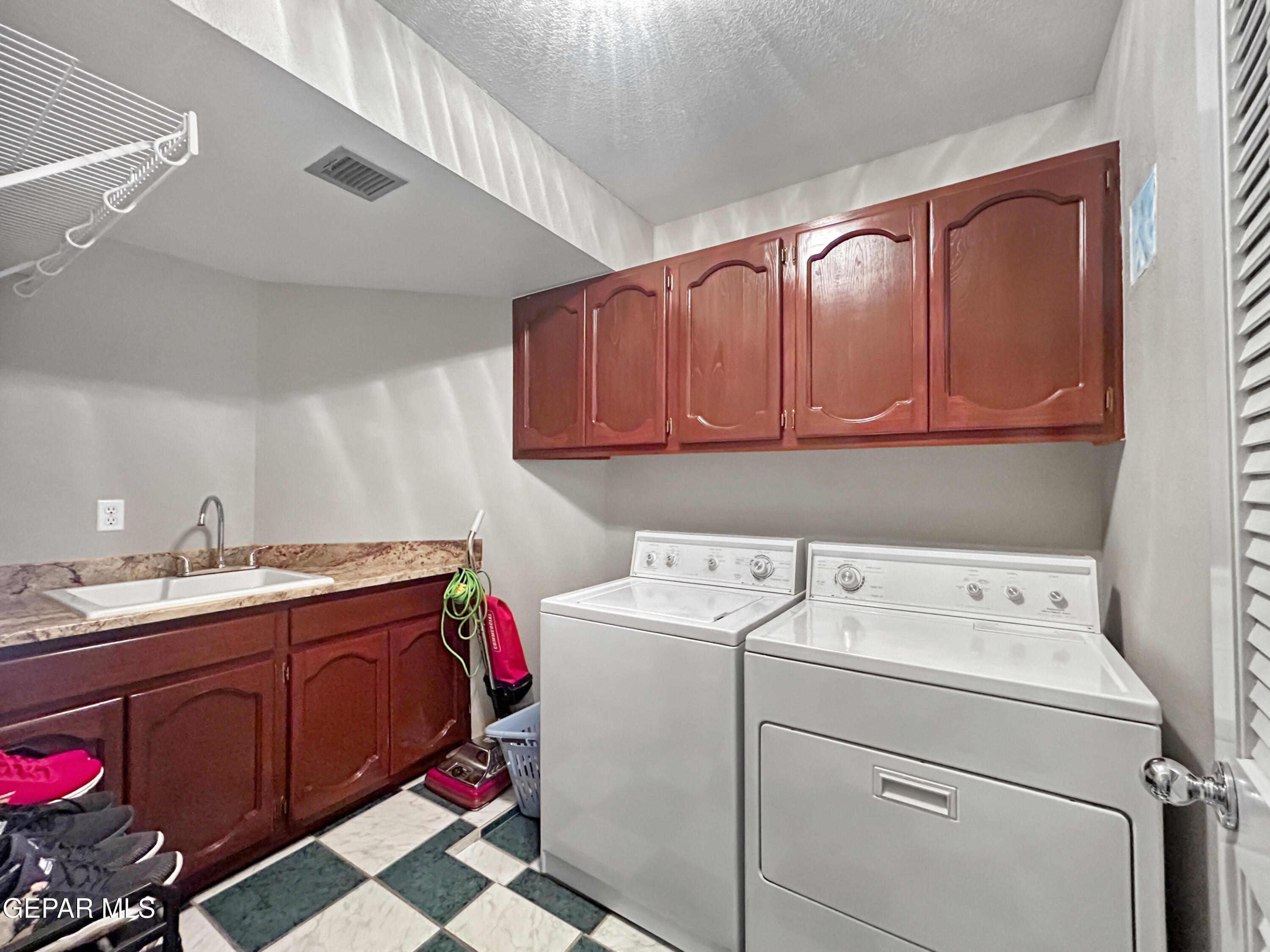 1109 Noble Ridge Way El Paso, TX 79912 - Photo 27 of 73 Laundry Room w/ sink
