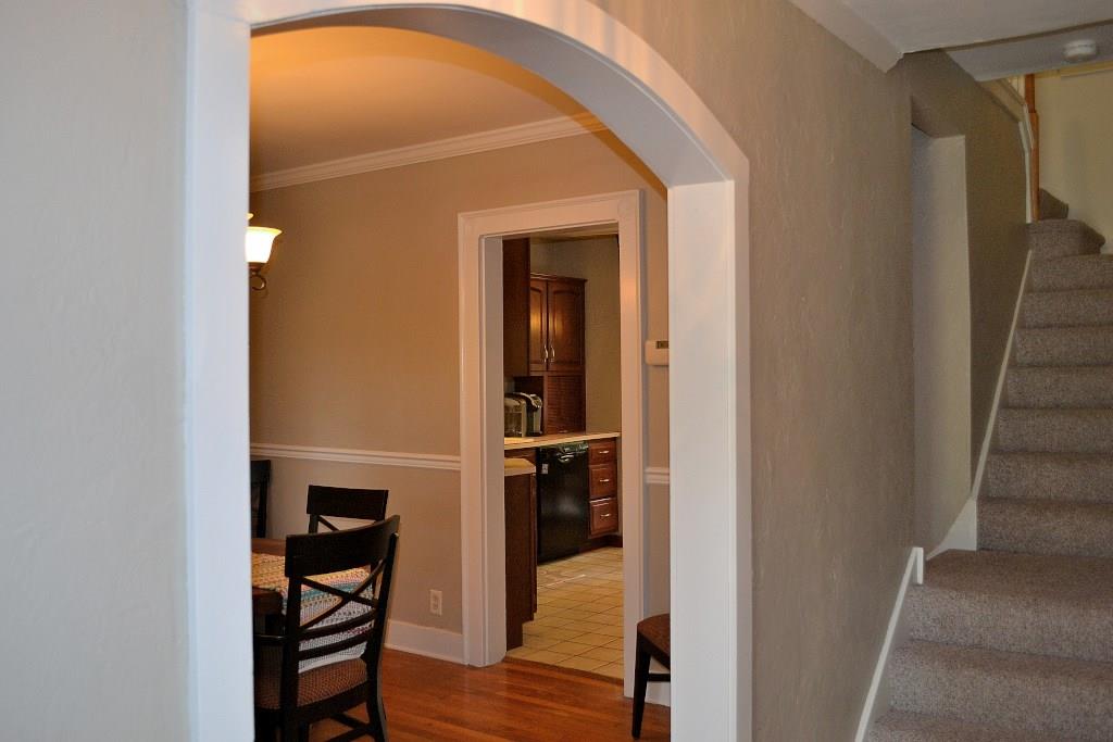 5600 Meridian Road Gibsonia, PA 15044 - Photo 6 of 25 The beautiful entry with stunning archways, opens to the dining room on the left, the living room on the right, and stairs to the second floor straight ahead. Look closely at the stairs, there is a butler staircase that leads to the kitchen.