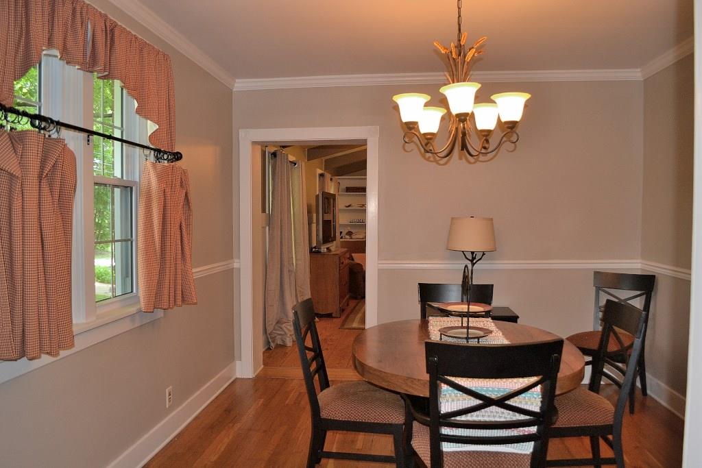5600 Meridian Road Gibsonia, PA 15044 - Photo 7 of 25 The interior of the home has been newly painted, and all the light fixtures are new. The dining room chair rail and crown molding are a nice touch. The floor is the original hardwood floor. Pass through the door into the family room addition (circa. 1950).