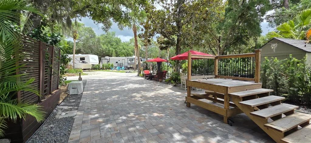 127 Stallion Lane River Ranch, FL 33867 - Photo 12 of 12 a backyard of a house with yard barbeque oven and outdoor seating
