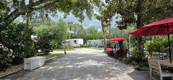 a view of a park with trees