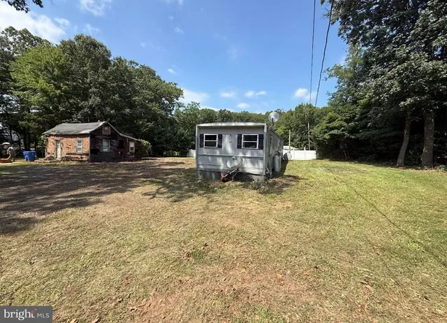 a house view with a garden space