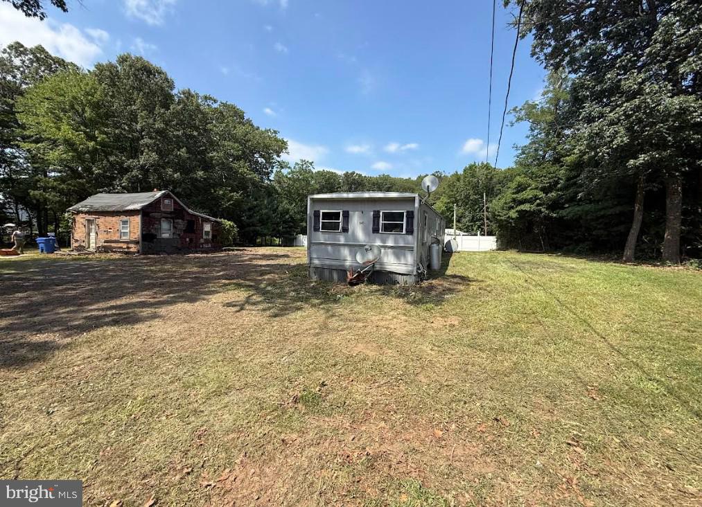 a house view with a garden space
