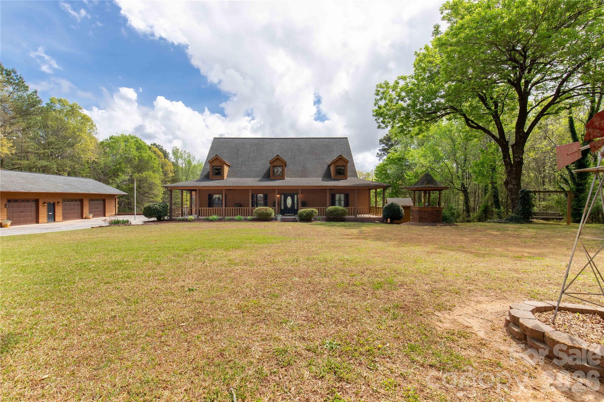 529 Langley Road Lancaster, SC 29720 - Photo 5 of 48 a front view of a house with a yard