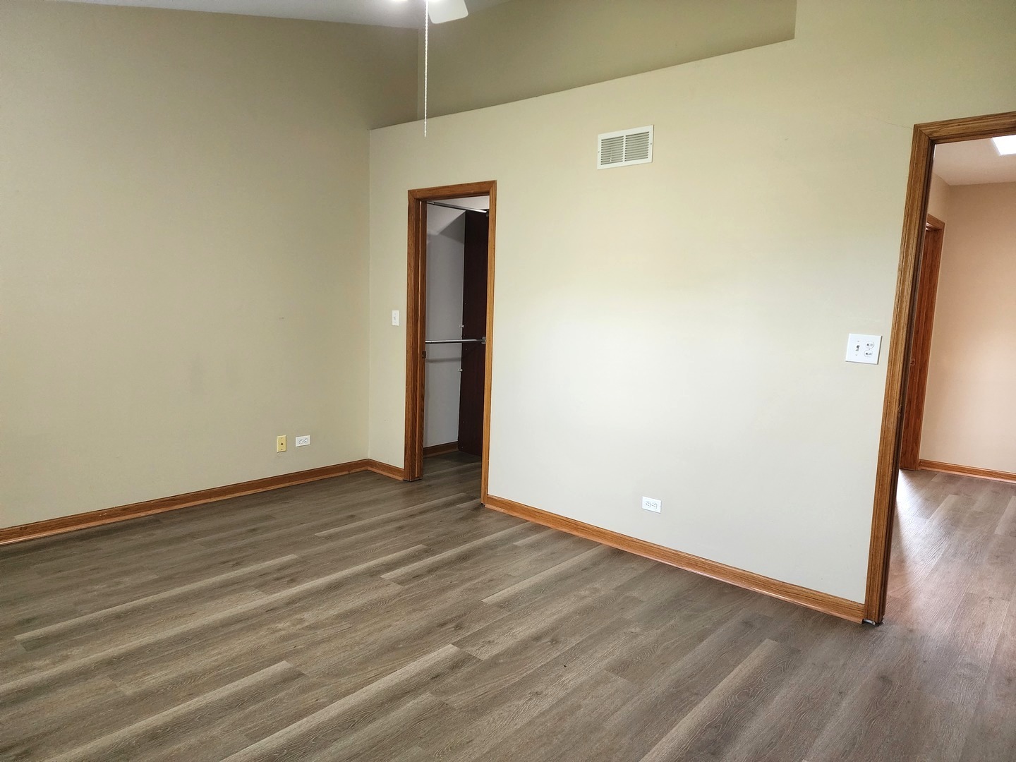 775 Highview Court Antioch, IL 60002 - Photo 11 of 16 a view of an empty room with wooden floor